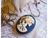 anyanka - the harbinger's charm - brass locket w/skeleton mistress cameo- natural solid perfume or cologne - major arcana lux aroma options