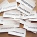 Iron On Boutique Labels - one sheet of custom fabric labels printed with your shop name on 100% organic cotton