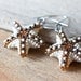 Beadwoven starfish earrings in amber and cream - unique whimsical 3d sea star beadwork earrings - marine creature seed bead beach jewelry