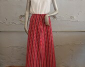 Vtg. 60s Aztec print hot pink maxi skirt