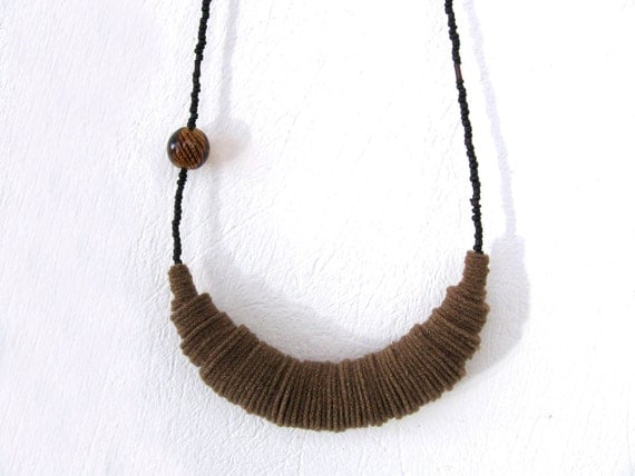 geometric chunky brown felt necklace with a glass bead - minimal contemporary jewelry