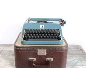 vintage Underwood typewriter with case