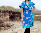 wrap dress in blue chinese dragon print with turquoise satin frills