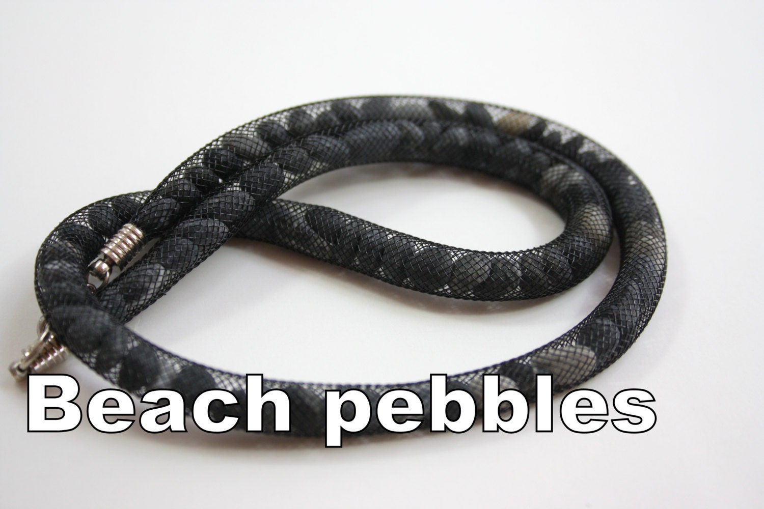 Beach Stone Necklace ... beachpebbles  in a flexible net tube...very unique jewelry...