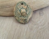 There is an angel in my garden  ceramic pendant art bead