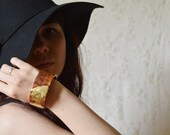 The sleeping beauty gold amourette red wood gold bracelet bangle