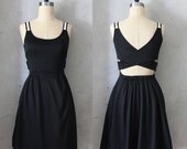 DERICA in Black - Jumper dress with pockets // crochet // day // criss cross straps // LBD // pleated skirt