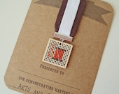 Arts & Crafts cross stitch badge