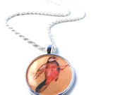 Bird necklace - a cute vintage image of a bird on a silver pendant
