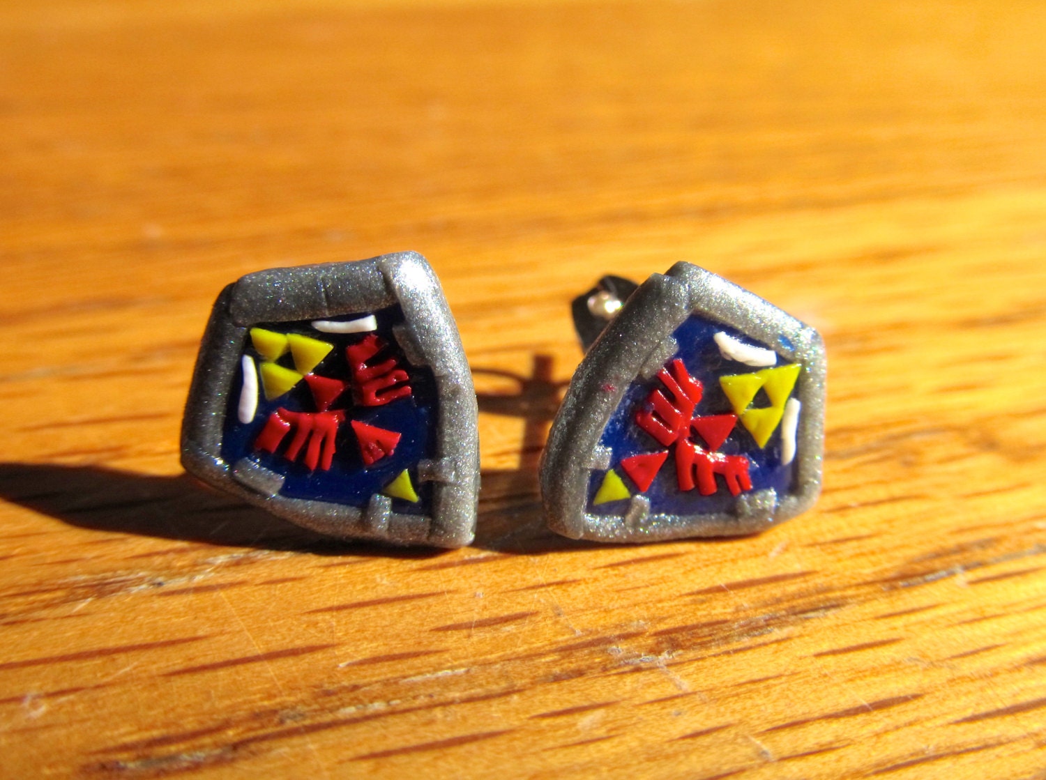 Hylian Shield stud earrings inspired by the Legend of Zelda