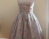 Gorgeous Plus sized 1950s style dress pink blue and green print