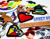 LUCKY DIP. Laser cut, Acrylic and Wood Dinosaur and other Fun Jewellery.