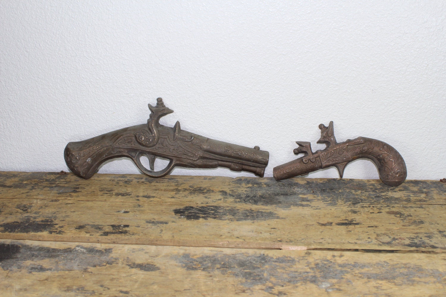 Two Rare Vintage Metal HODA Gun Pirate Musket Sculpture Wall Hangings