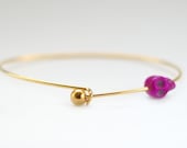 22K Gold Plated Wire Bracelet with Magenta Howlite Skull Bead