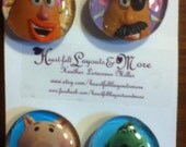set of four Glass magnets with Toy Story characters.