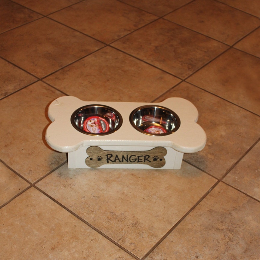 Small bone shaped dog bowl holders