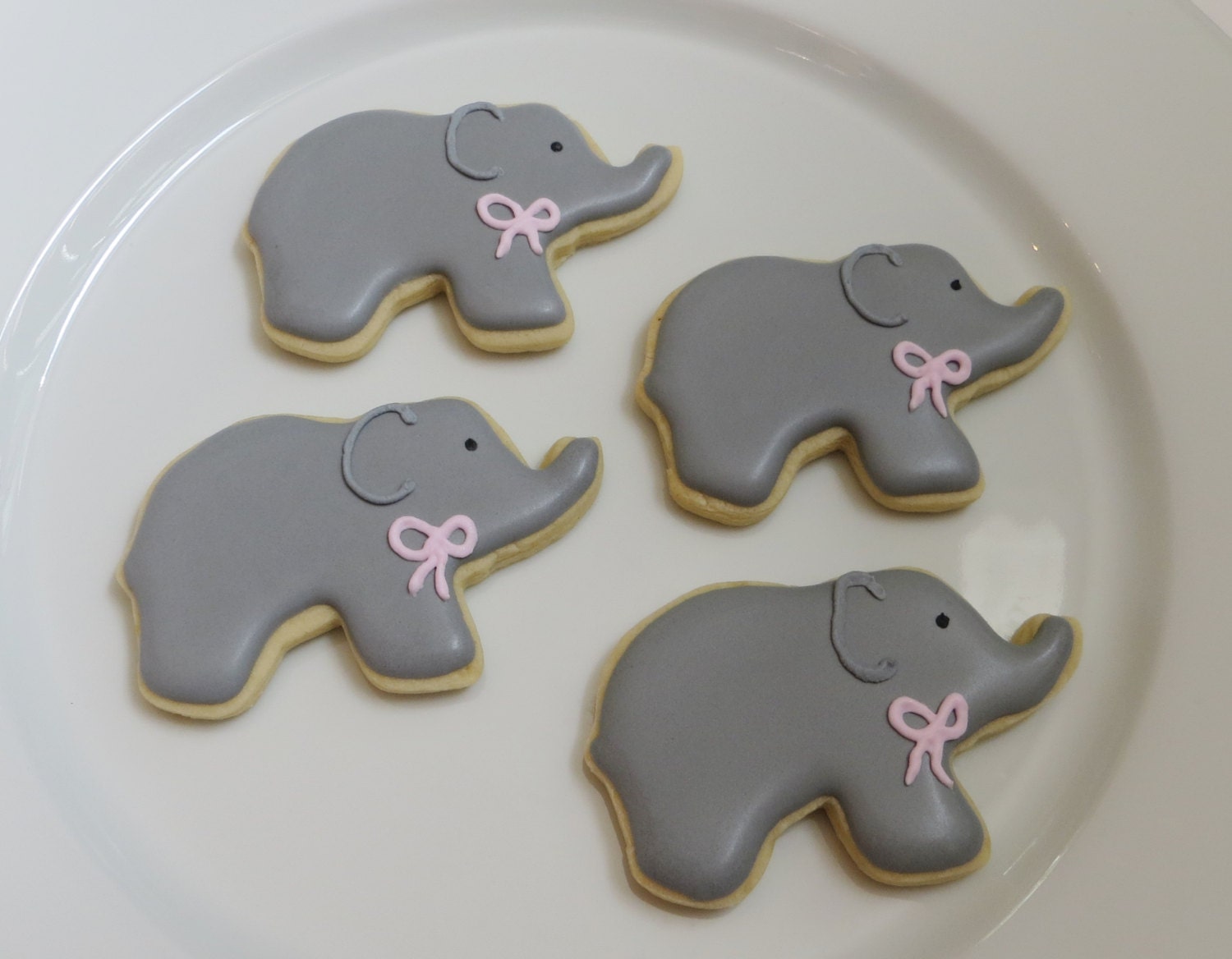Elephant cookie favors for a baby shower/ baby gender reveal, decorated with a bow in your choice of color, 1 dozen