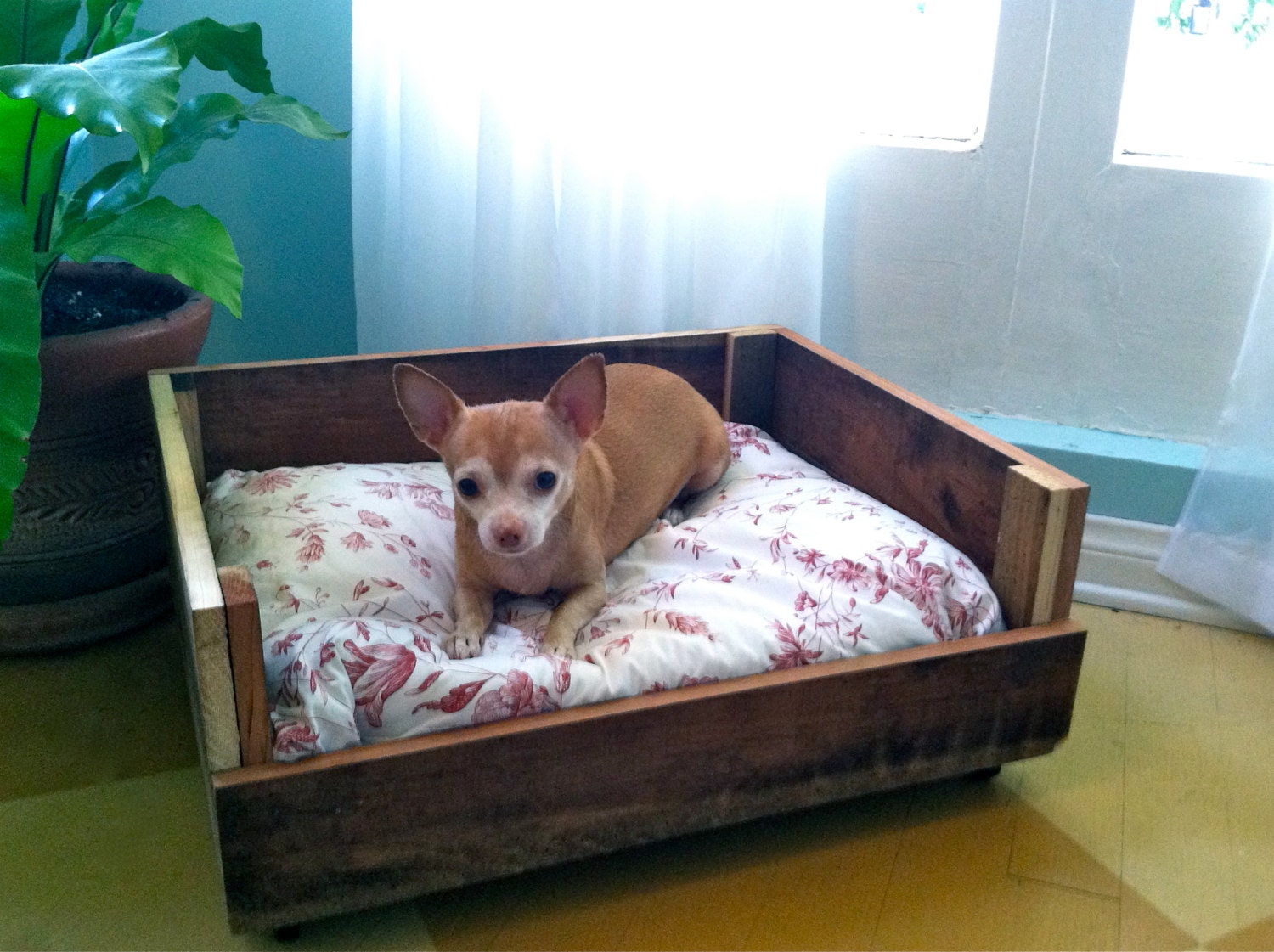 Pet Bed made out of reclaimed wood and vintage fabric.
