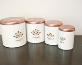 Set of 4 Vintage White Metal Canisters with Copper Colored Lids, Floral Design - Flour, Coffee, Tea, Sugar