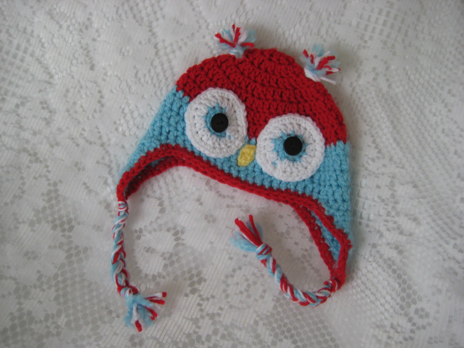 Baby and Child Owl hat crocheted by hand in soft tomato red and blue in yarn
