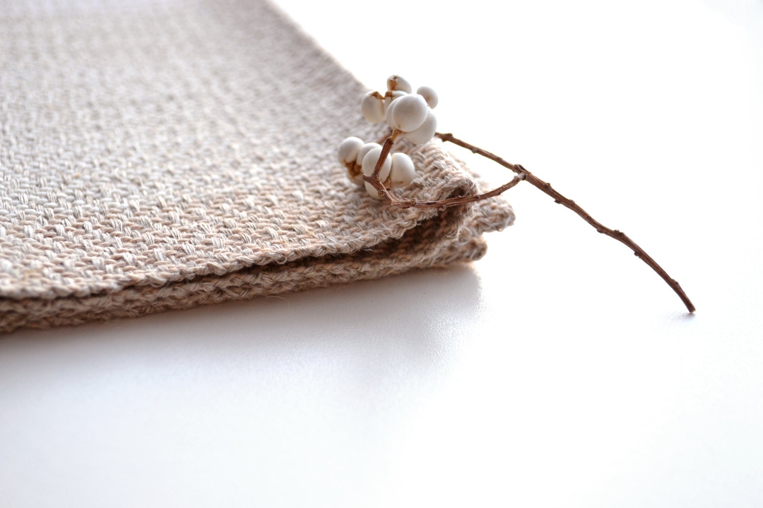 handwoven organic linen towel in earth tones, house, kitchen decor from natural materials with rough texture and surface