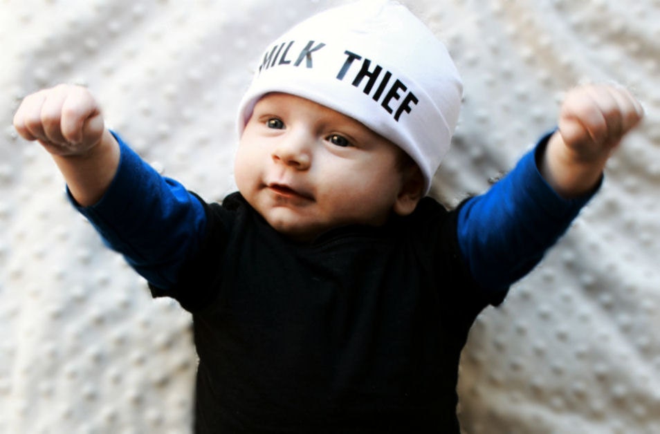 Breastfed Nursing baby Newborn hat. Boy or girl. White Beanie with unique 'Milk Thief' funny saying. Gender Neutral / Unisex