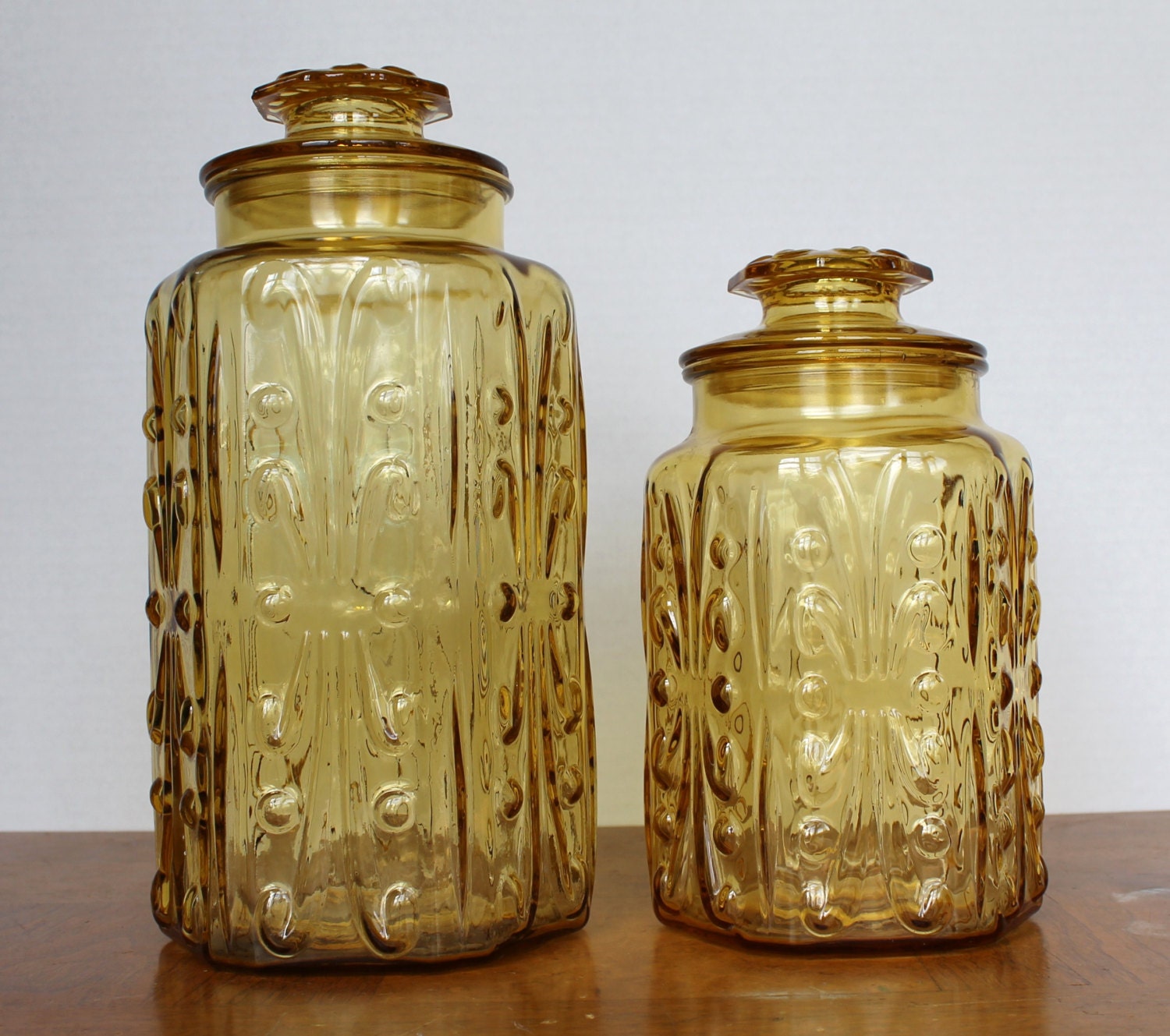 Two Extra Large Amber Colored Glass Canisters by LovejoyEstate