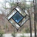 Stained Glass Suncatcher, Blue & Clear Bevels, Wire Curls