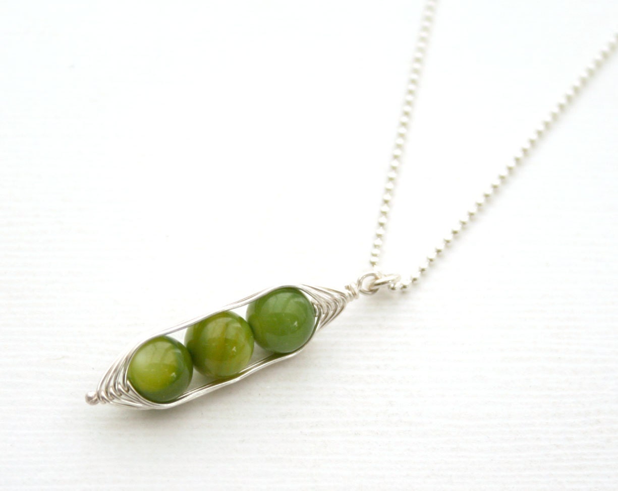 Peapod necklace. Three peas in a pod, green mother of pearl pendant on sterling silver chain.