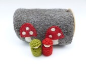 Felted wool log with wood peg dolls