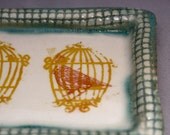 intense yellow flame orange bird cage ceramic serving tray