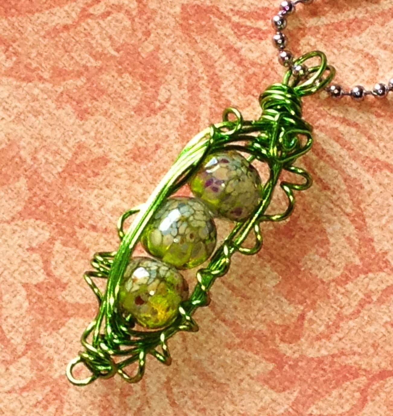 Lampwork bead wire wrapped Peapod pendant
