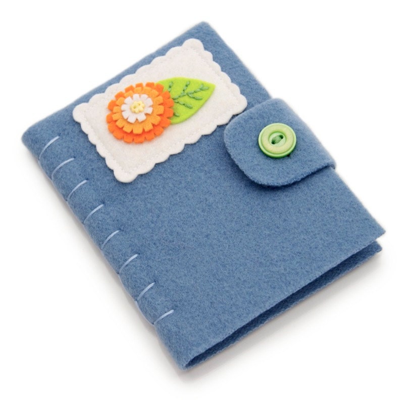 Blue needle book wool and felt with orange felt flower hand embroidered by jenn maruska
