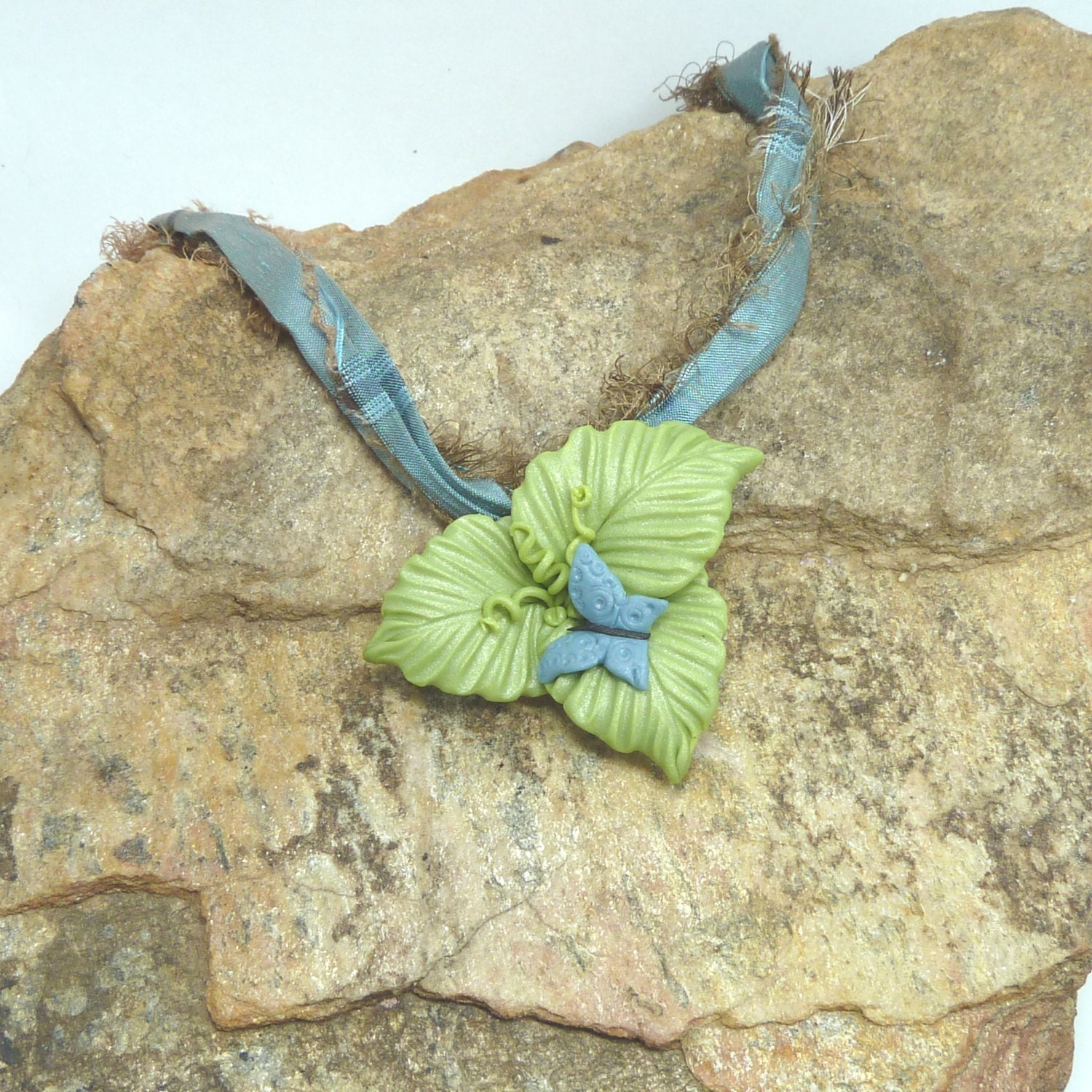Green Leaf  Pendant with tiny Sky Blue Butterfly