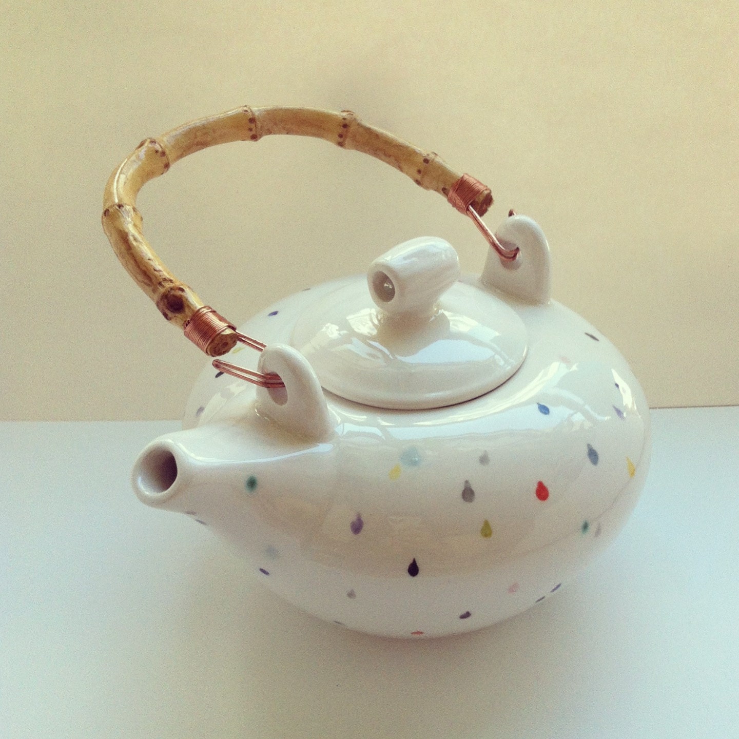 one hand painted colorful raindrop teapot - japanese style with a bamboo handle