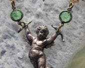 The sweetest little Eros stamping to make into a vintage brass necklace for Spring..