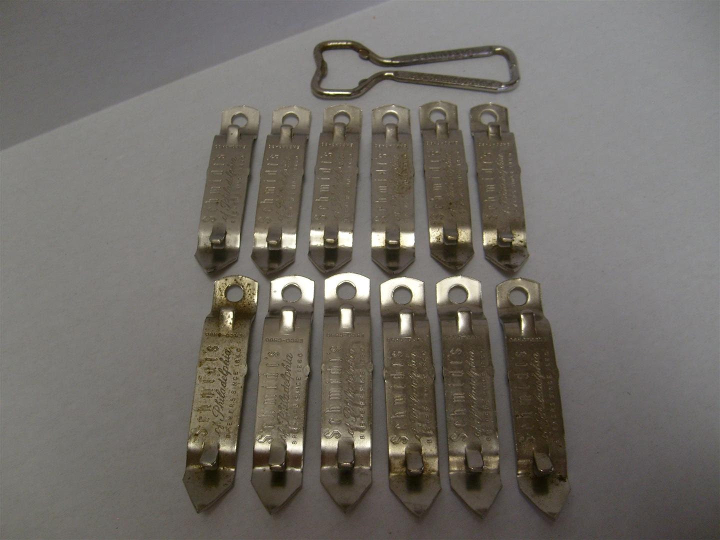 12 Vintage Schmidts Can Opener Punchers plus one 1 Bottle Opener