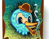 Mini Blue bird smoking with his hat on