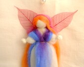 Wool blessing fairy art doll Waldorf education in blue and purple