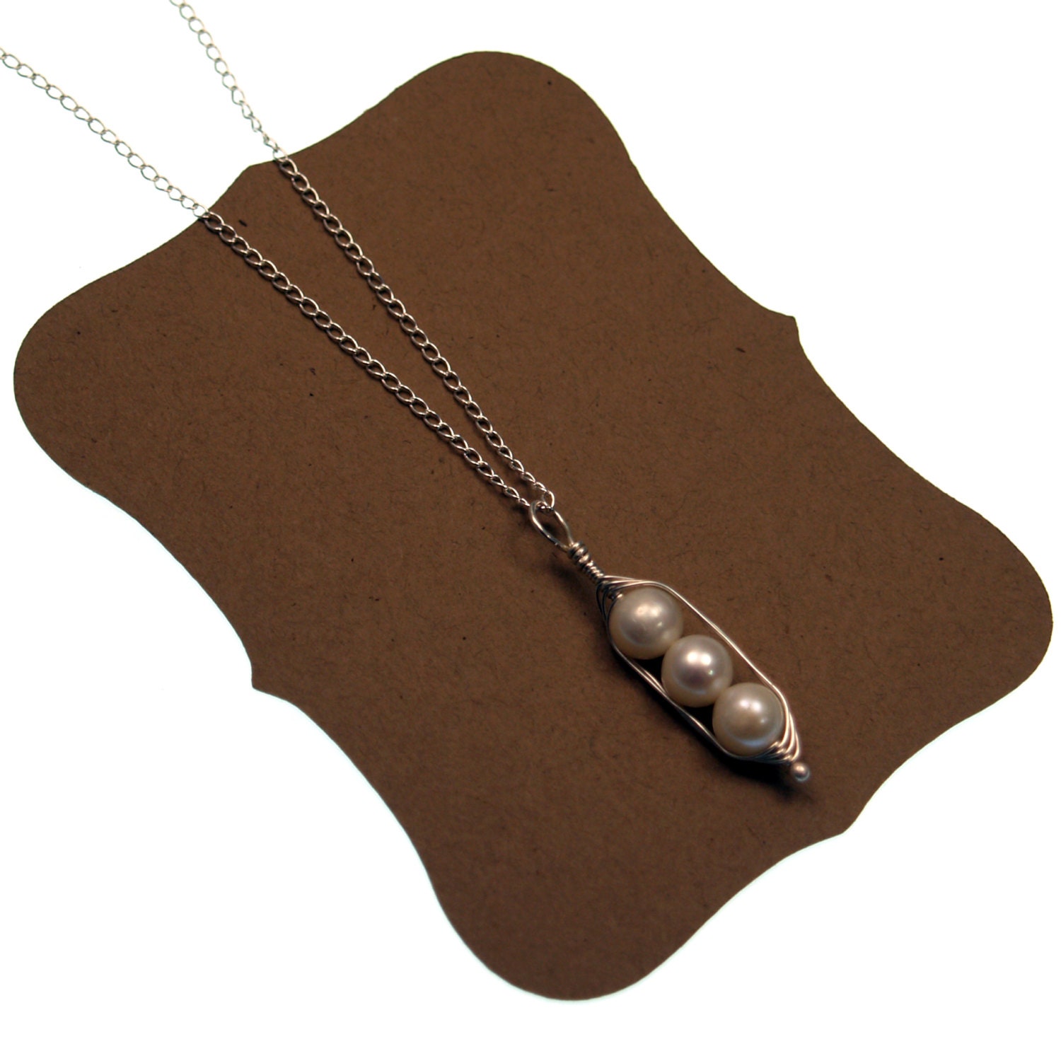 sterling silver pea pod necklace with three peas