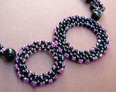 Circles - Multi-Strand Beaded Necklace with Black Onyx and Beadwoven Circle Pendant