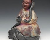 Laughing Buddha Statue in Raku Clouds and Golden Lightening