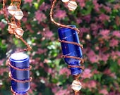 Suncatcher - Set of 2 Little Blue Spirit Bottles With Copper Wire Wrapped Iridescent Clear Glass Marble Prisms