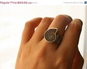 CLOSING SALE Discovering Fossils-Sterling silver cubic zircon and ammonite.