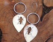 Beetle silhouette earrings