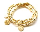 TenThings. gold. OM. beaded bracelet.