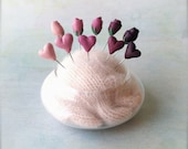 Hearts and Roses decorative handmade pins in ombre pink shades on a recycled wool and glass pincushion