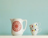 Red spirograph medium sized pitcher