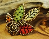 Felt and zipper multi leaf brooch