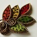 Felt and zipper multi leaf brooch